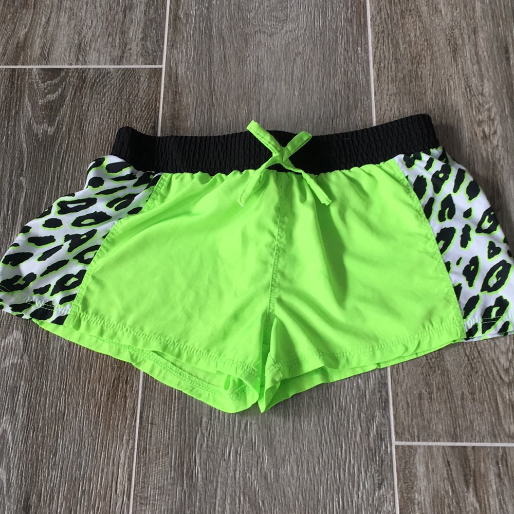 Two pairs of neon leaped print shorts!